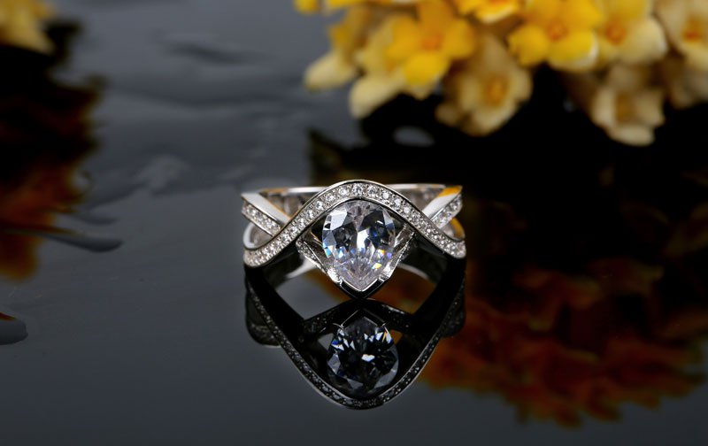 Jeulia Twist Pear Cut Created White Sapphire Engagement Ring