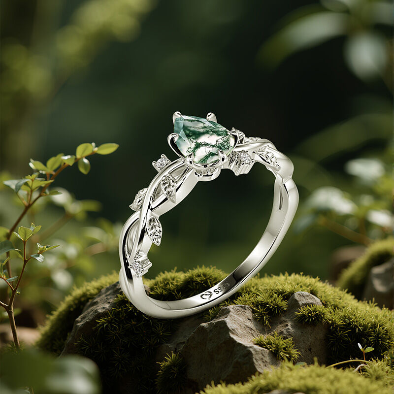 Moss Agent Engagement Rings