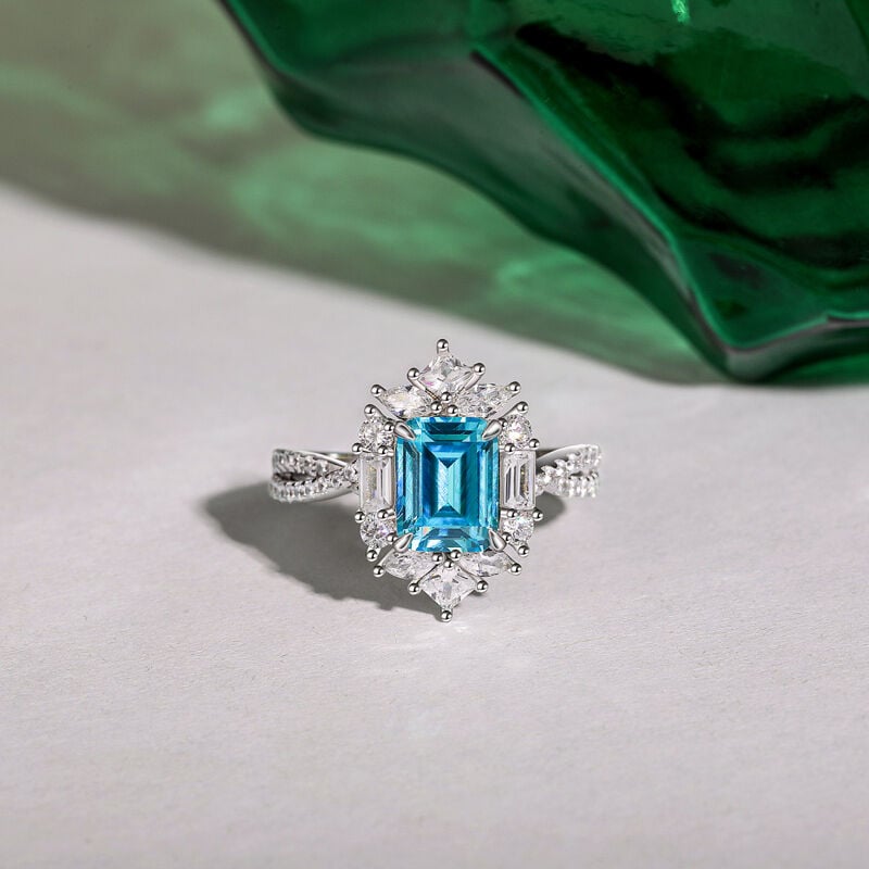 Twist Halo Emerald Cut Engagement Ring