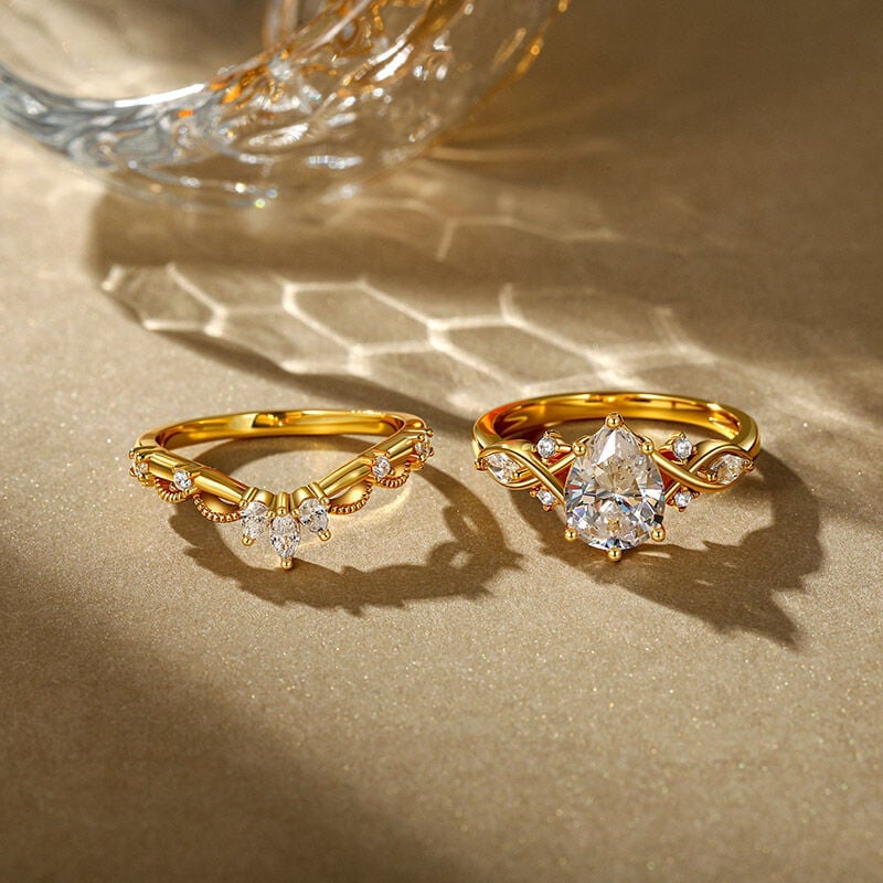 Infinity Gold Pear Shaped Engagement Ring Set