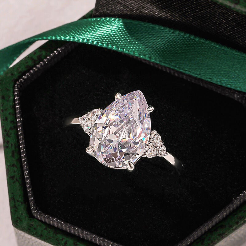 Three Stone Pear Shped Engagement Ring