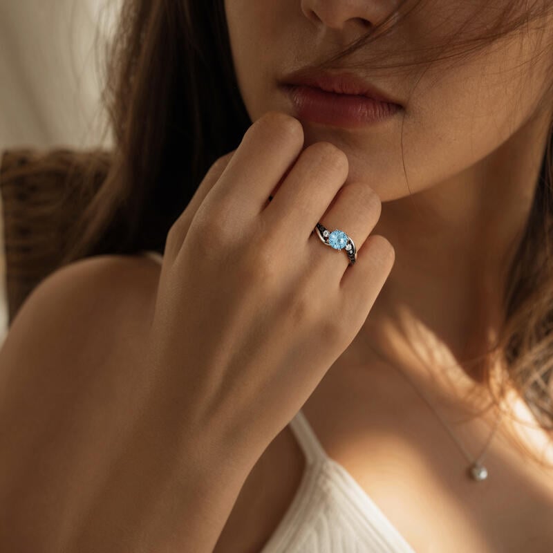 Firework Cut Blue Topaz Bypass Ring