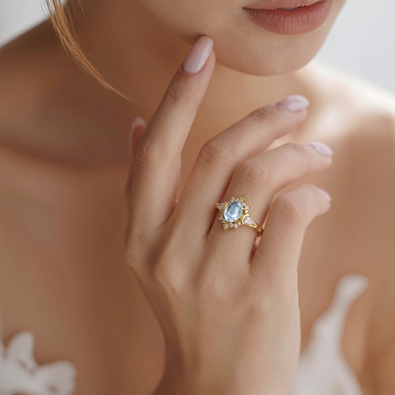 Gold Triple Moon Blue Topaz Ring